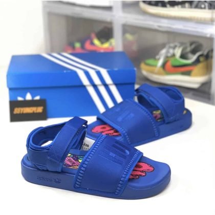 pharrel-williams-human-race-adilete-sandals-blue